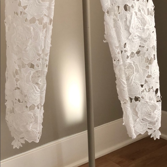 Banjul two piece white floral suit. - Picture 4 of 4